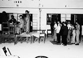 Part of the ceremony for the opening of the TANG's ancestral hall. (This part held outside the new village school). (Image)