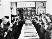 Women lay Buddhists praying in a temple, 1963