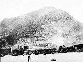 01-18-487|Central District waterfront and Mid-Levels viewed from the harbour, 1933.