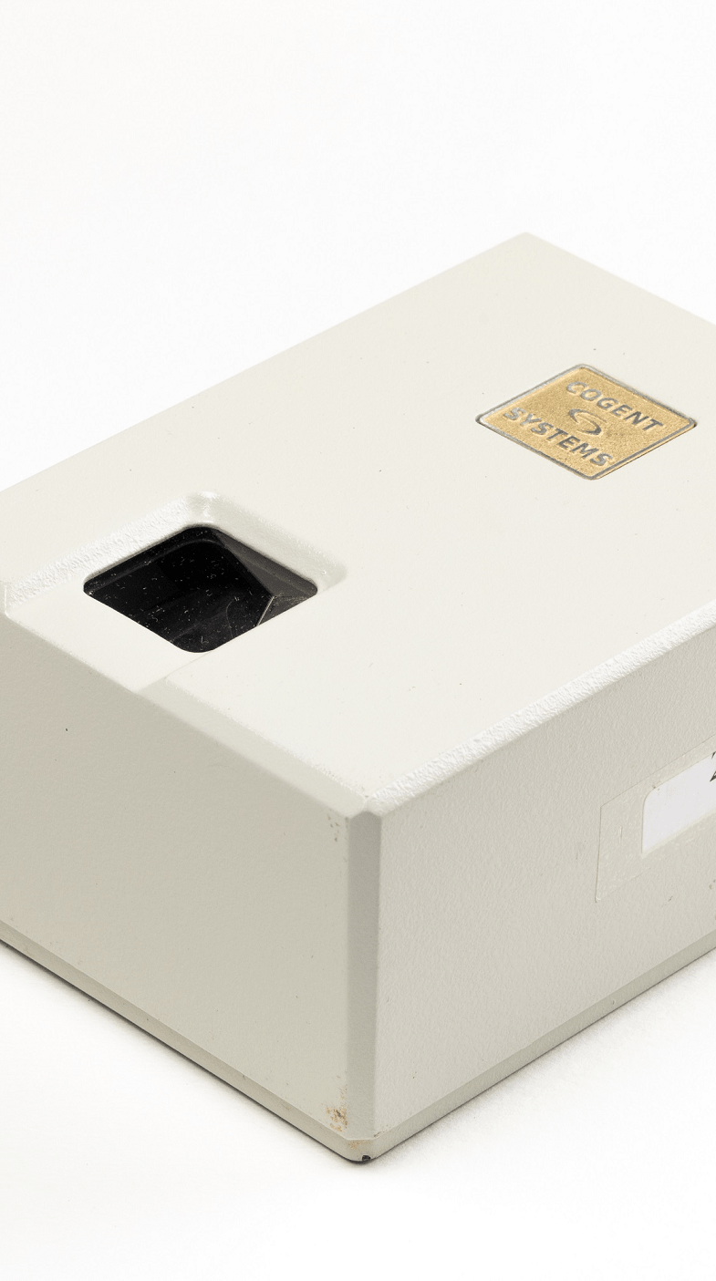 A thumbprint scanner for ID card registration. (2003) Courtesy of the Immigration Department