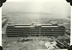 The new Resettlement Factory Building at Cheung Sha Wan completed in October 1957 contained 94,000 sq ft of factory floor space for the resettlement of workshops and factories using power-driven machinery, December 1957.