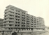 One of the blocks at Wong Tai Sin Estate consists of 103 self-contained flats of two sizes with monthly rent at $45 or $65 and shops opening on the ground level, March 1958. 