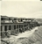 Cottages built by the National Catholic Welfare Committee in Ngau Tau Kok Resettlement Area for the resettlement of some 800 squatters from the Kwun Tong refuse dump, March 1955.